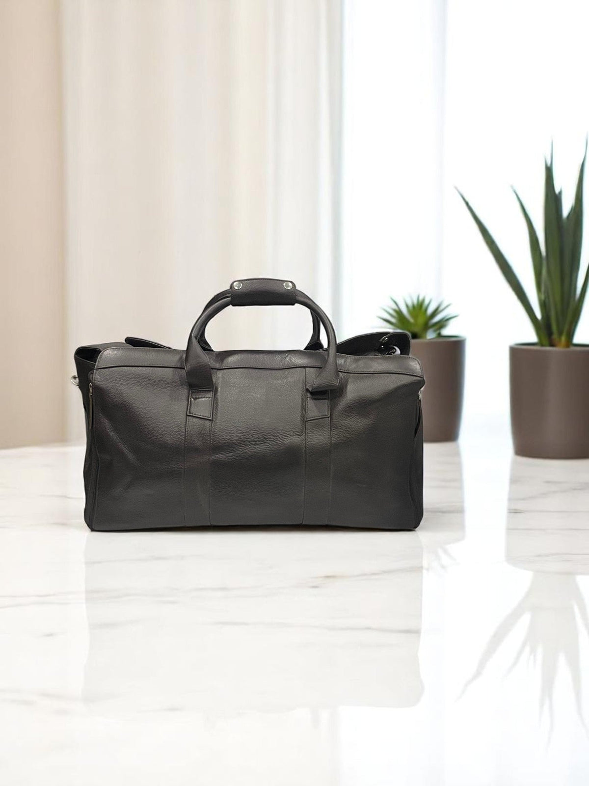 Fringe Black Leather duffle  Masterpiece